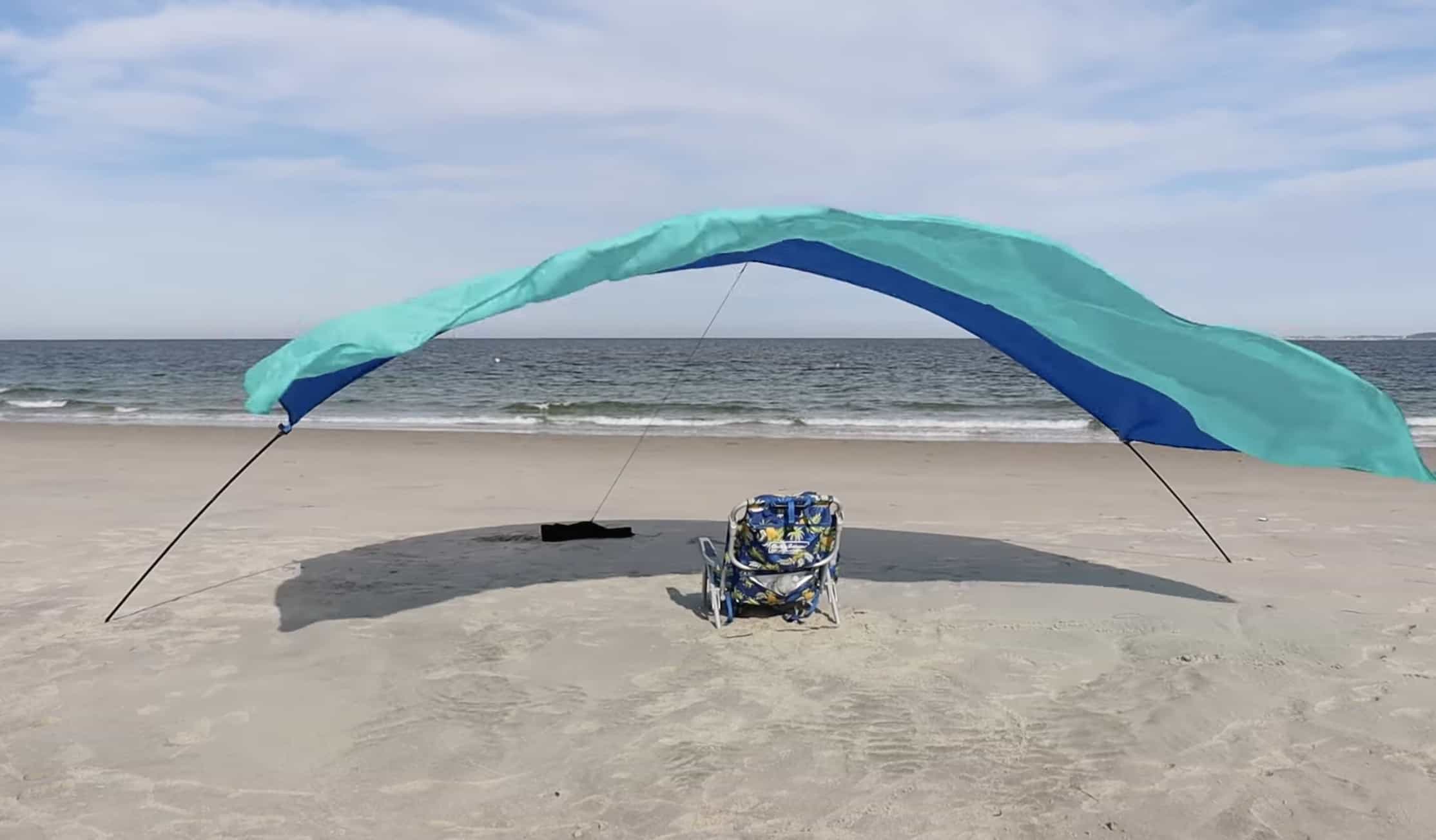 Shibumi Shade and beach chair on sand